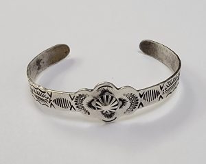 Fred Harvey Bracelet with center Rosette, Crossed Arrows, and Snakes