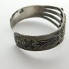 Side view of Fred Harvey Arrow Novelty Company Navajo Turquoise and Sterling Silver Thunderbird Bracelet