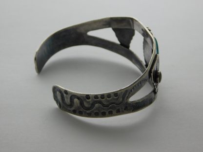 Side view of Fred Harvey Arrowhead, Arrow, Snake, Cerrillos and Blue Turquoise Sterling Silver Bracelet